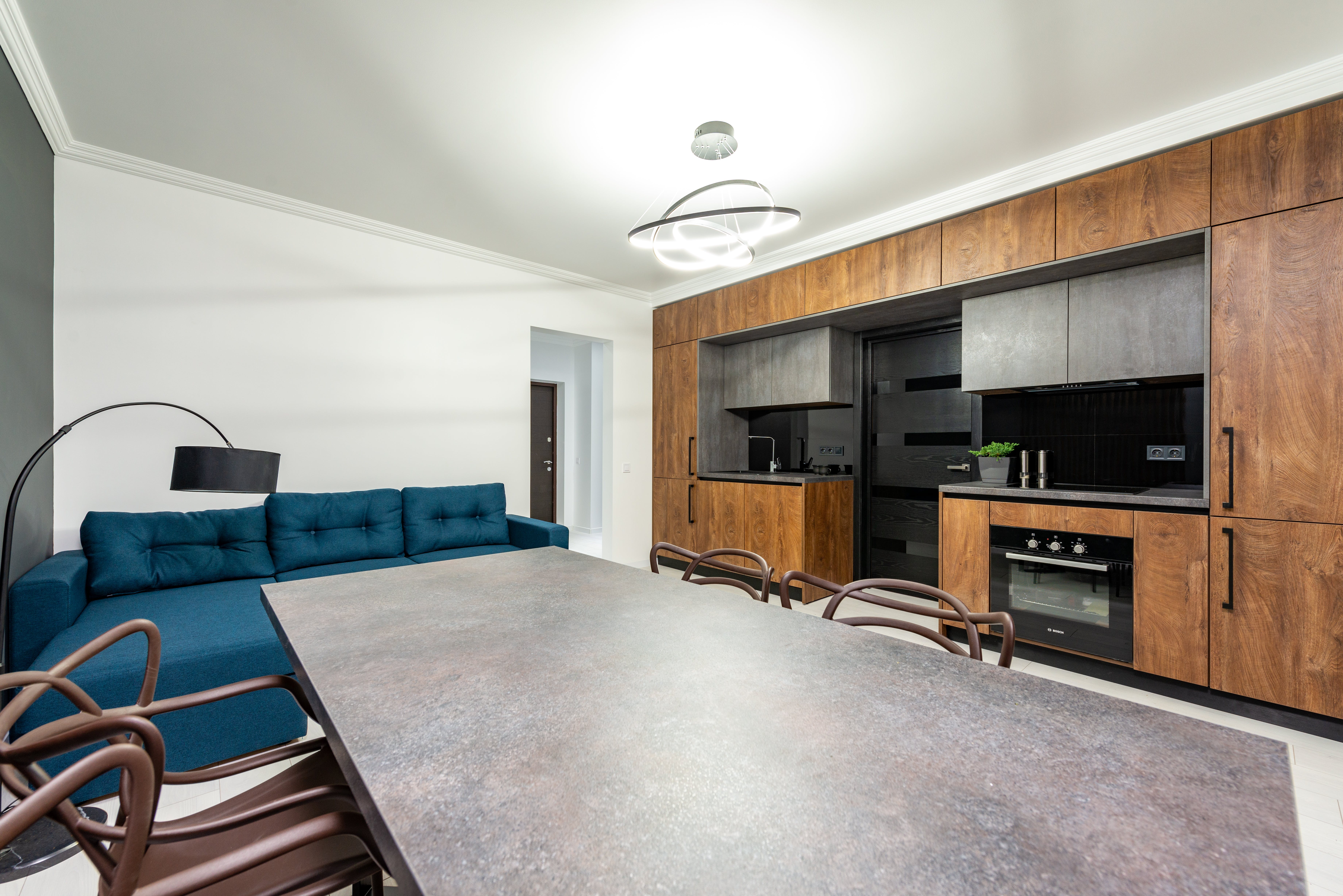 a brown and white modern kitchen